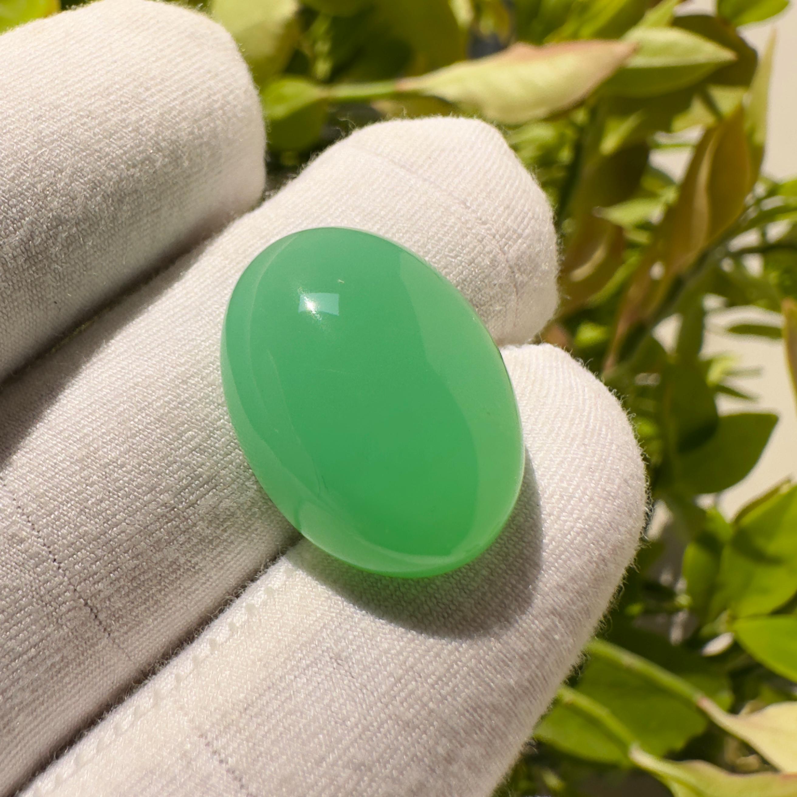• Stone Name: Natural Chrysoprase • Shape: Oval • Cut: Cabochon • Size: 21 × 15 × 8 mm (Approx) • Weight: 19.40 Carats (Approx) • Quantity: 1 Piece